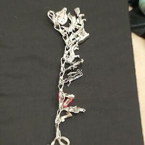 Silver Multi-Charm Bracelet with Red Accent